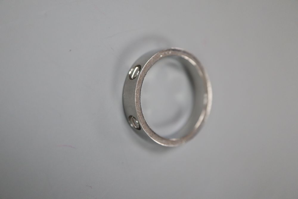 A Cartier 750 white metal Love ring, numbered 52833A, size 3.8 grams.